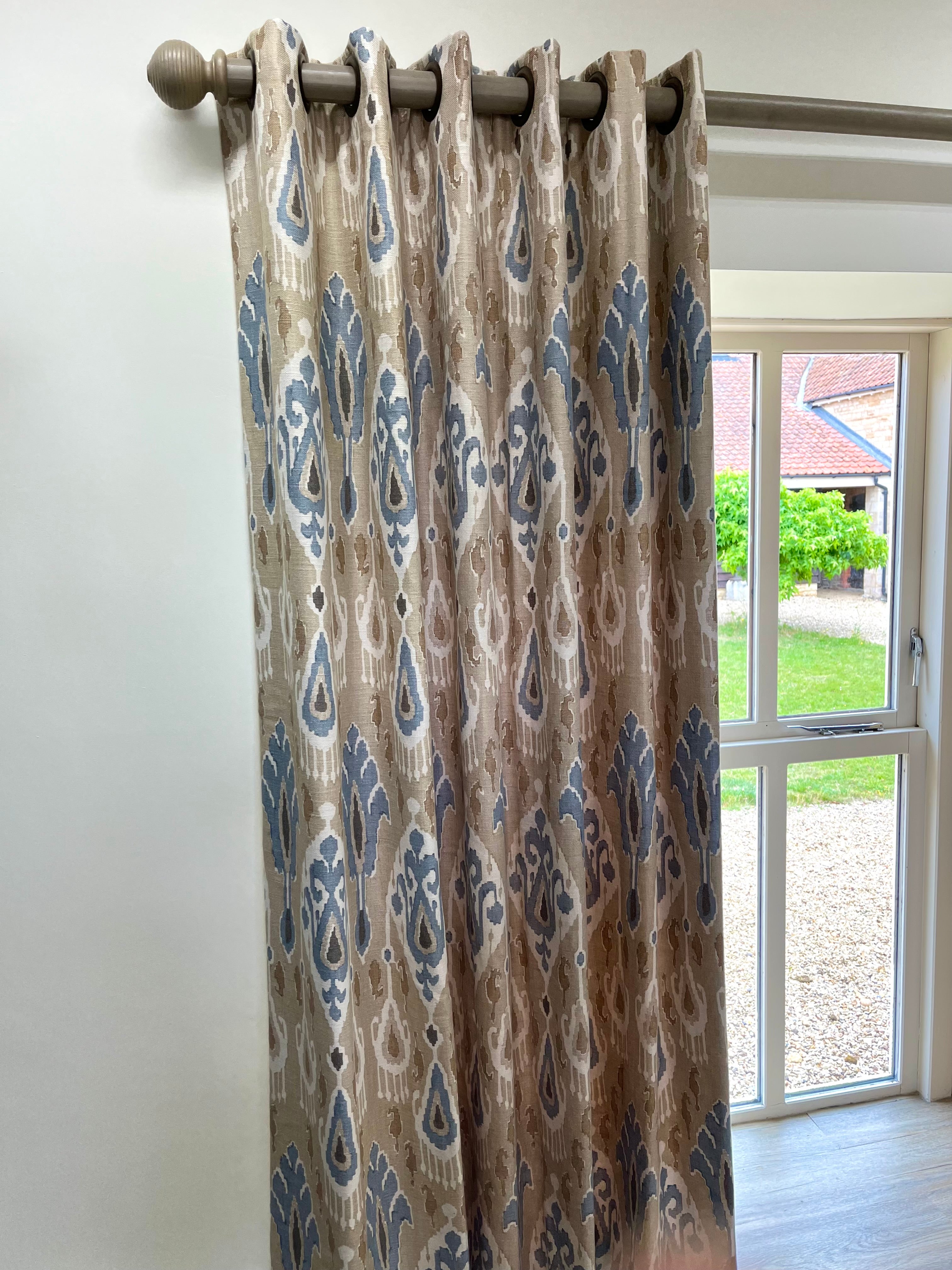 Eyelet Headed Curtain in G P & J Baker fabric - Ikat Bokhara Sand