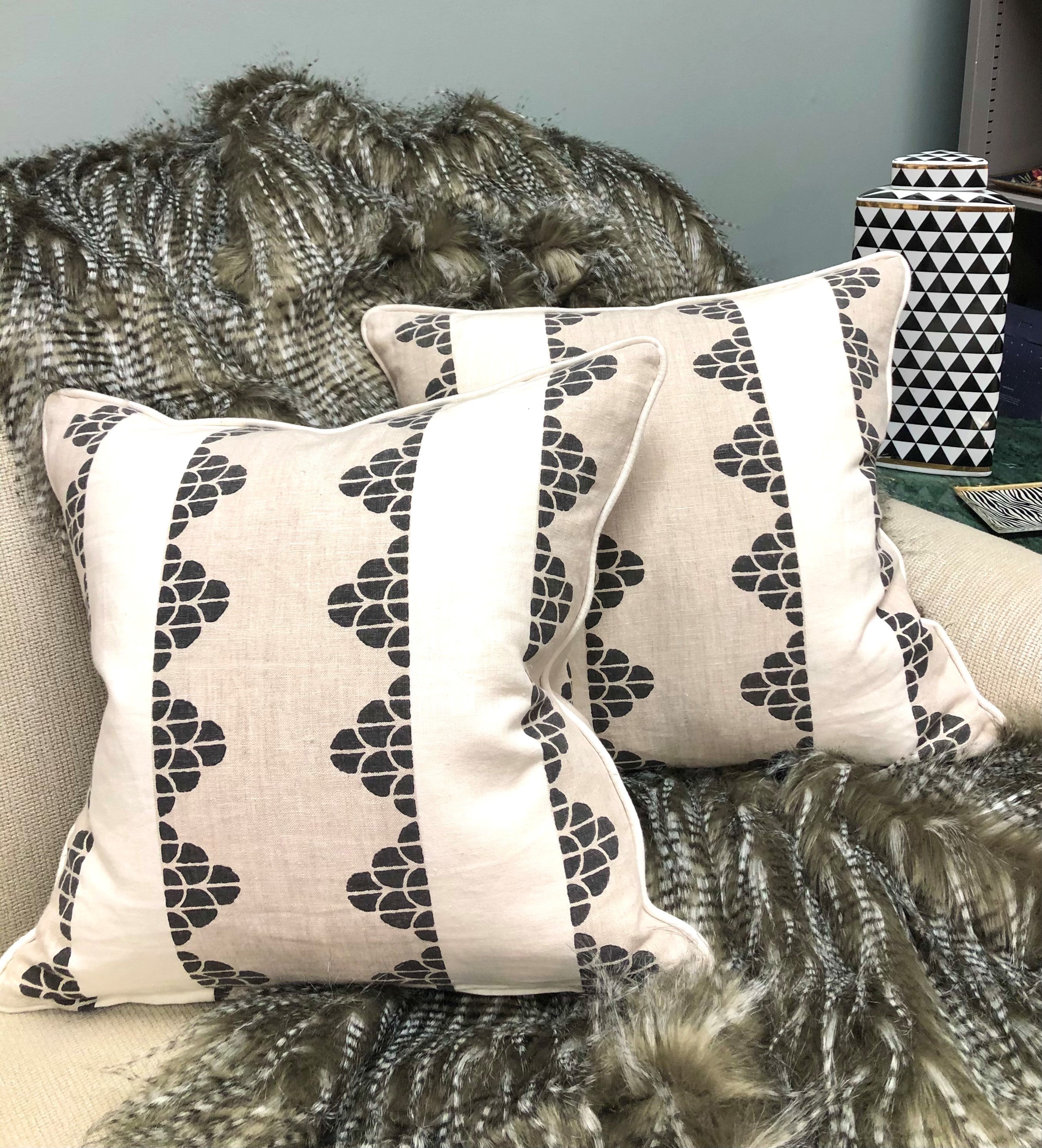 Cushion in Thiabut Dhara Stripe Beige & Black