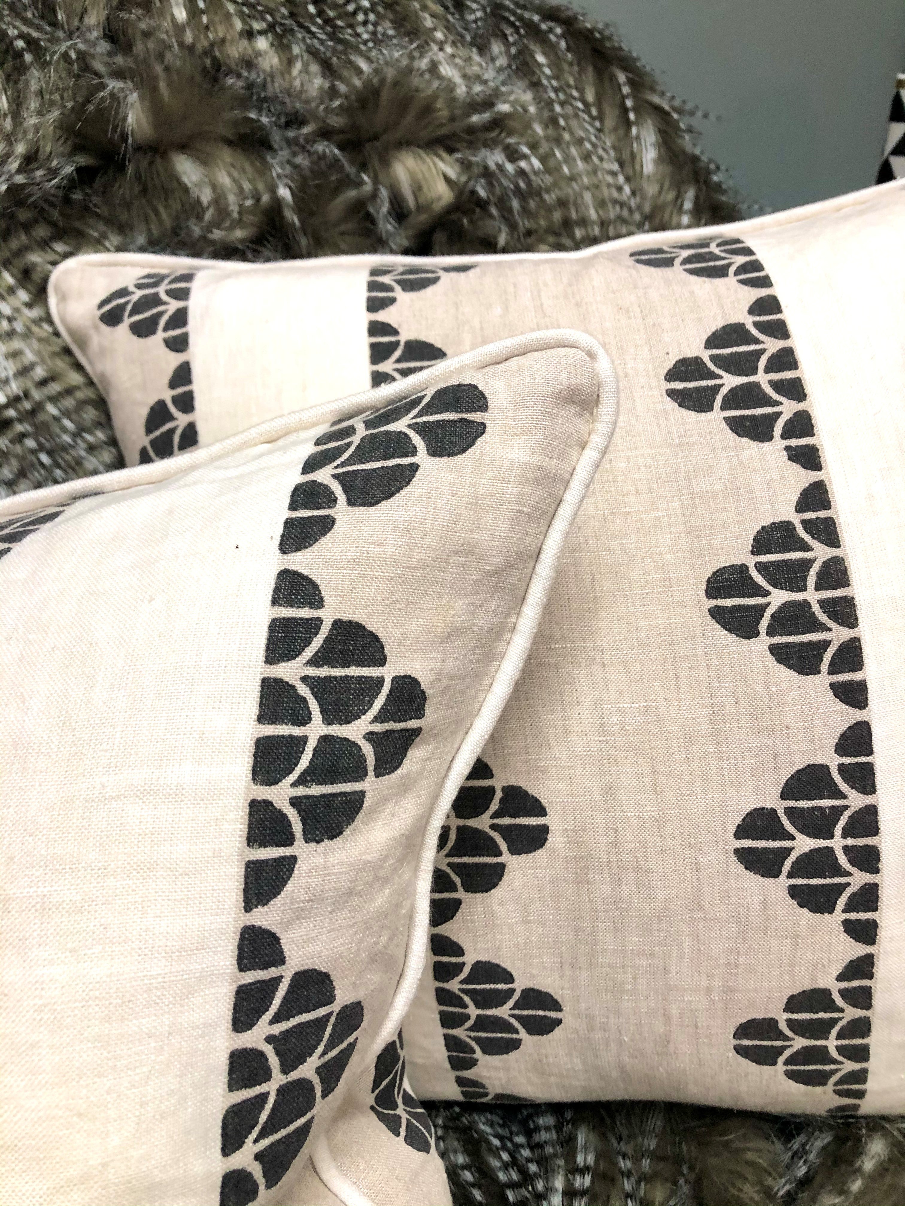 Cushion in Thiabut Dhara Stripe Beige & Black